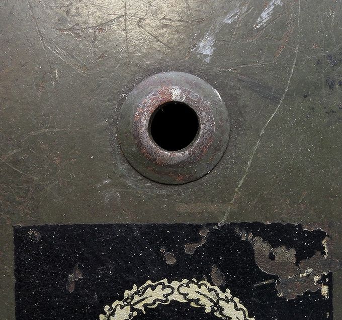 M35 ET air-vent bushing. As with all vents on M35s, the air-vent bushing is pressed into to an opening in the shell. The air-vent bushing is a separate part.