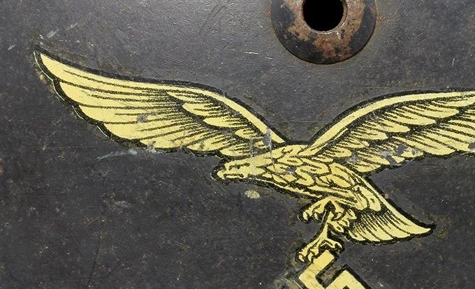 Luftwaffe decal on an M35 NS. Notice that the claw appears to “hover” over the swastika as opposed to clutching it.