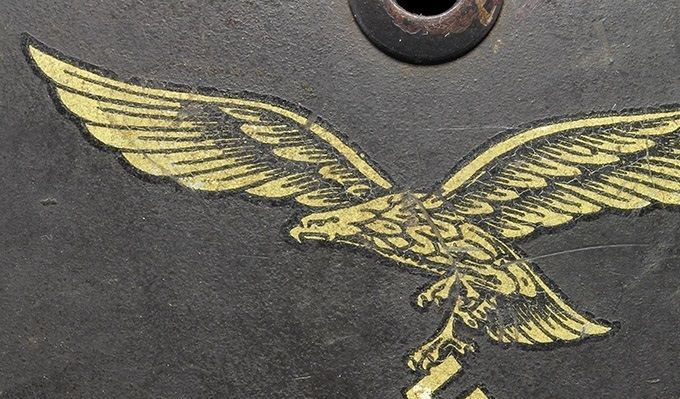 Luftwaffe decal on an M35 NS. The same type of decal as pictured above. Notice the golden color resulting from the lacquer on the decal yellowing over time