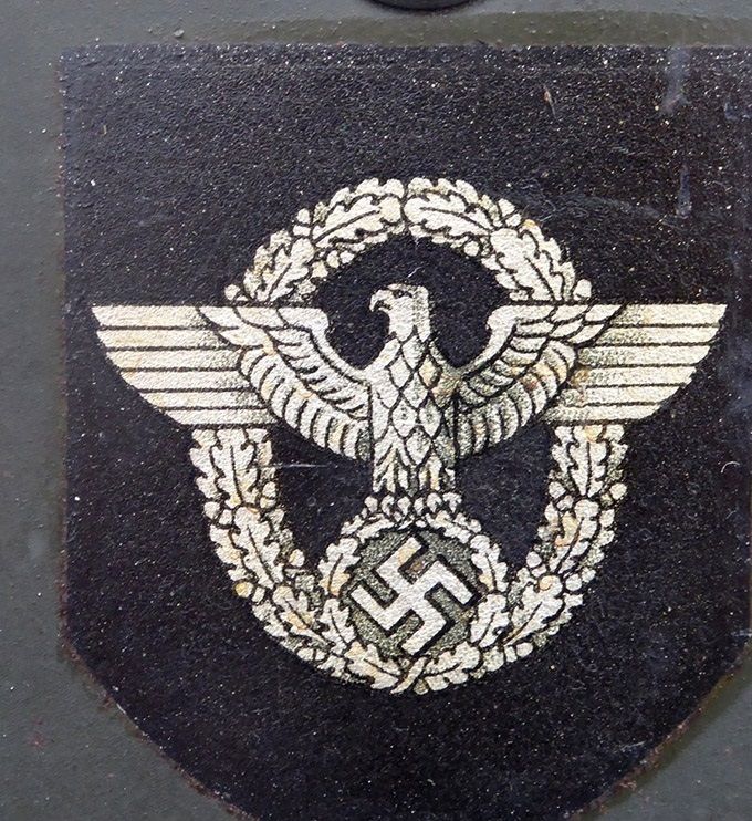 Polizei decal on an M35 NS. Note the fine details and the row of talons clutching the oakleaves.