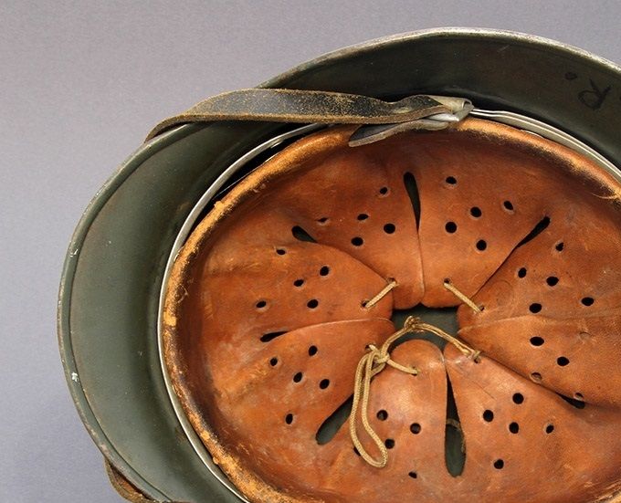 This leather liner has a deeper red-brown color. Like the leather liner above, this could be a result of the dyeing process.