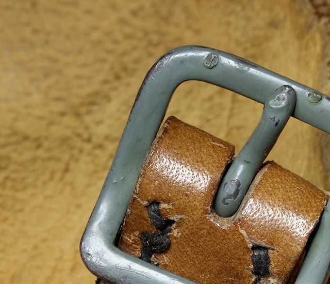 Painted steel buckle on an M35 reissue. The color is more grey than the previous steel buckles shown above.
