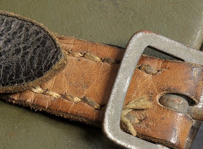 Brushed steel buckle on an M40.  