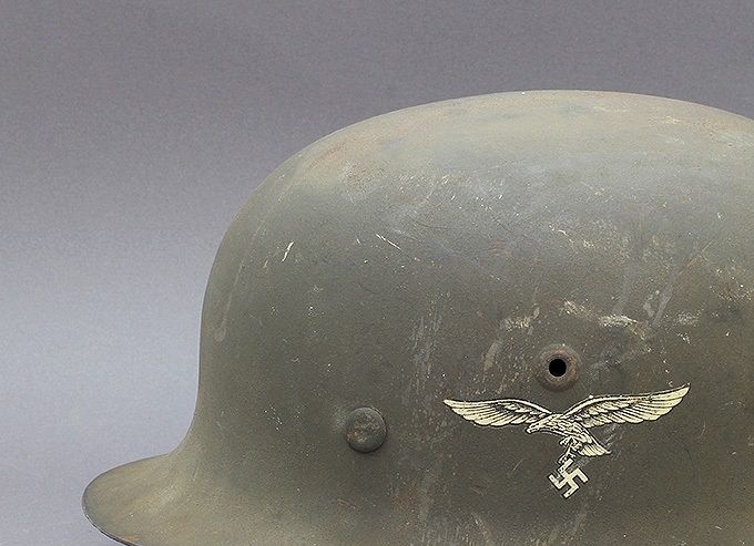 M42 NS LW. Corrosion/rust bleed  can be seen through the thin layer of factory paint.