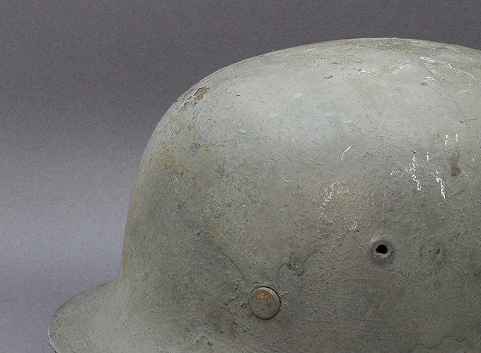 M42 ET66 with shipboard gray paint. This helmet was found near a former Kriegsmarine base in Norway.