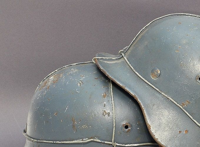 Two medium blue M40 Quist 64 LW helmets with single bailing wire. Both were found together in Norway (Lars Aasen collection).