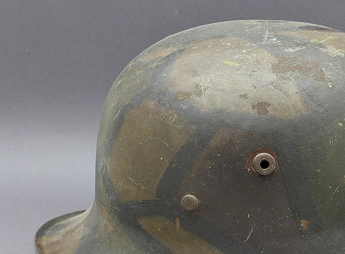 M17 T.J. 66 (C. Thiel & Söhne, Lübeck) regulation camouflage painted in brown, tan-green and green with thick black dividing lines. Purchased in the USA.