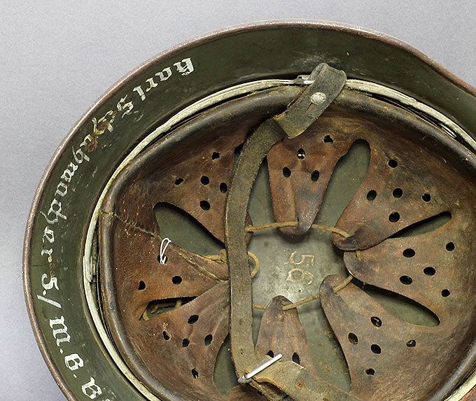 The liner of the M35 above. Notice the naming on the skirt and the size stamp in the dome.
