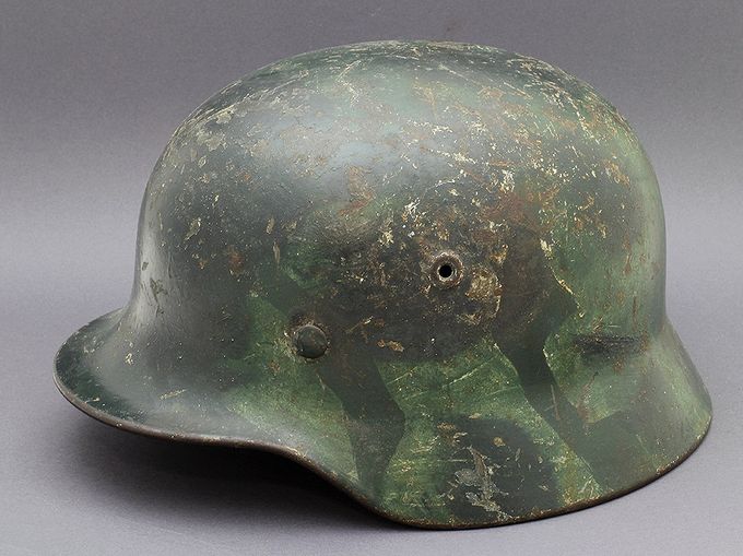M40 Q66 with a green zigzag pattern. Notice the white winter paint in spots where the camouflage layer has worn off.