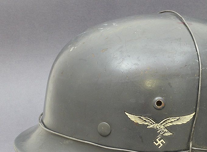 M35 ET66 LW DD with single bailed wire. The helmet is unused, was found in a German depot at Fornebu, Oslo (another Norwegian collection).