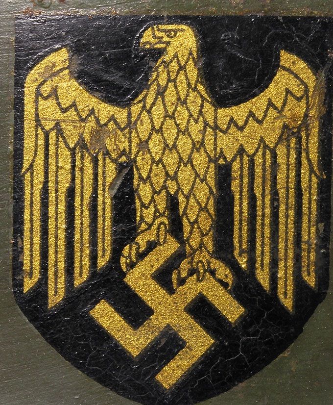 KM decal on an M35 ET. Notice the detail of the two-sheet construction that results in a border line around the eagle/swastika, particularly noticeable on the upper side of the wings and around the eagle head.
