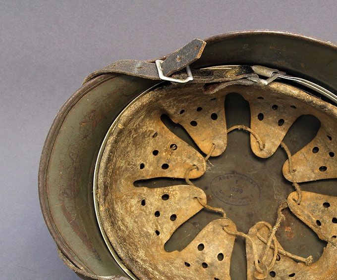 The liner of the M35. Notice the dome stamp.