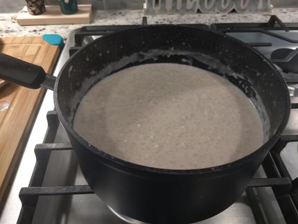 Hot cooked rice pudding, you can add raisins or chopped nuts