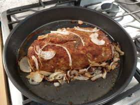 Meatloaf after cooking for 45 minutes before frosting with mashed potatoes