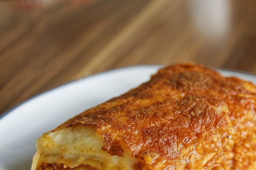 Mom's lasagna was made with fresh dough. It was soft and tender....