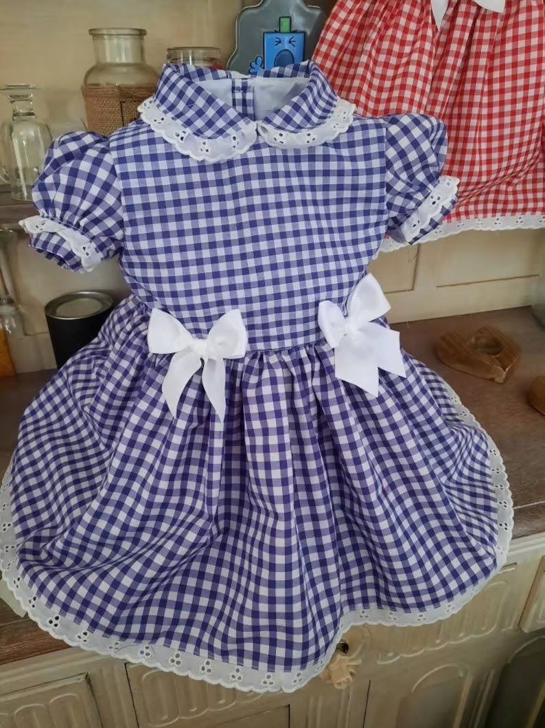 Here's another. Don't forget the handkerchief pinned on the dress.