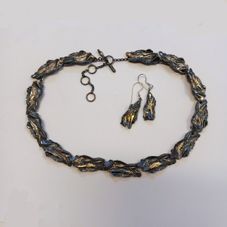 oxiderat silver, 18k guld
