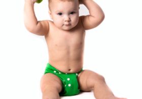 stock-photo-85464015-baby-kid-toddler-in-green-diapers-doing-exercises