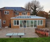 Aluminium conservatory with 5-panel bifold door