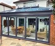 Aluminium conservatory with 5-panel bifold door all in anthracite