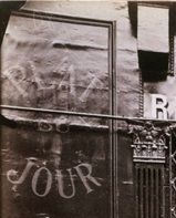 Cabaret « Au Réveil Matin », 
Cage with birds at the entrance door 
Rue Amelot
Atget
(Musée Carnavalet)