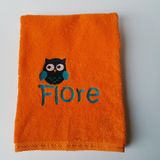 oranje handdoek met naam en tekening