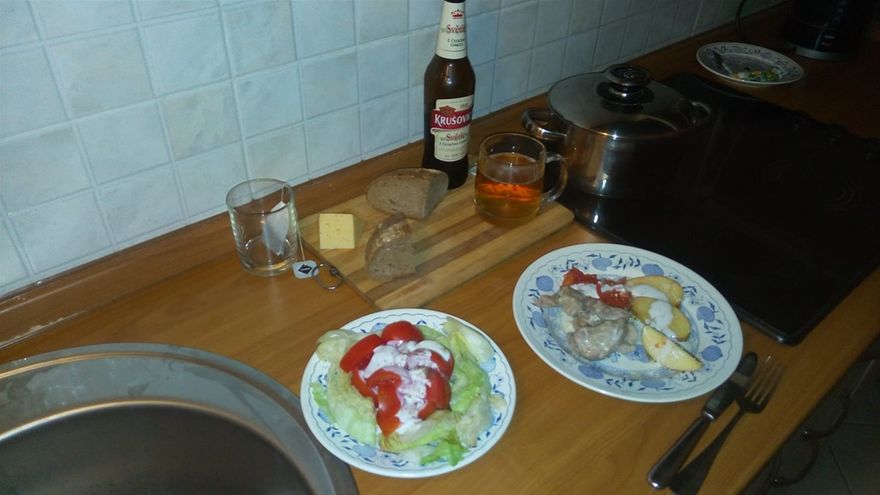 ONE OF THE MEALS I COOKED...DUCK & STEWED APPLE WASHED DOWN WITH LOCAL BREW IN KIEV