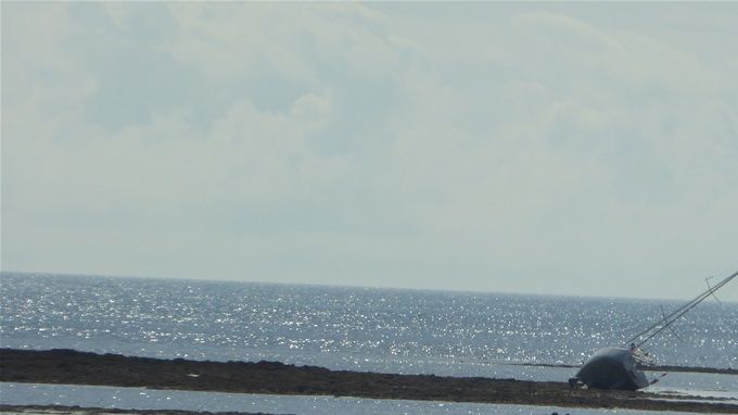 Attention au rocher et a la mer montante