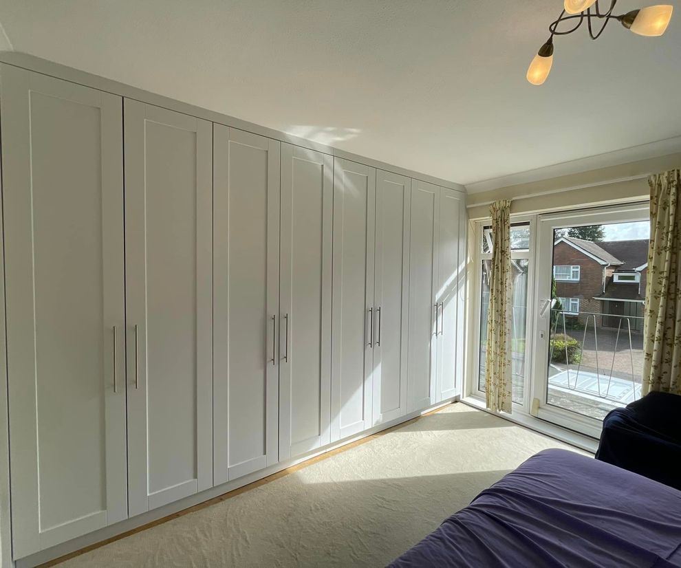 four double door wardrobe with shaker style doors and modern handles