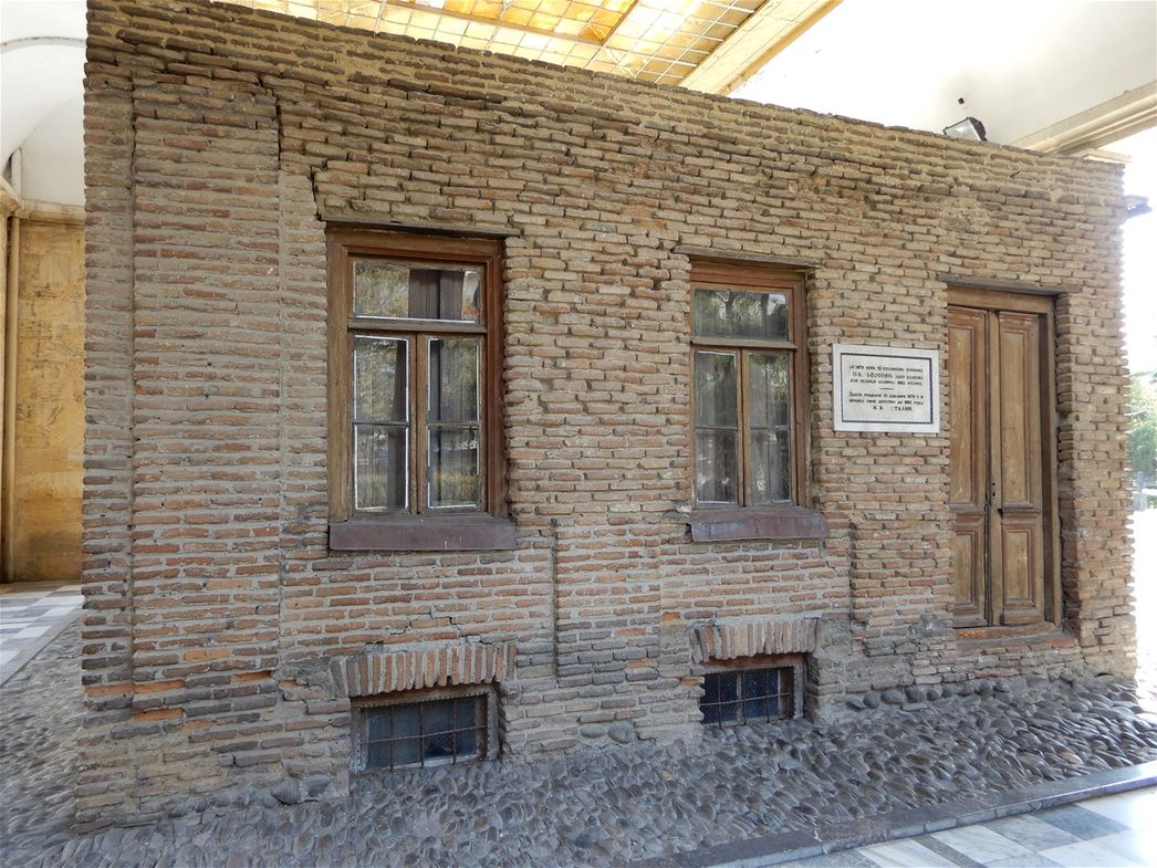 The house originally formed part of a line of similar dwellings, but the others have been demolished.  Here's the side entrance to the house.