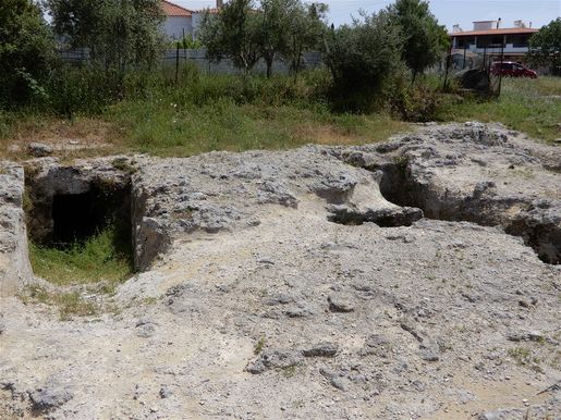 Mycenean tombs in a field outside Chora.