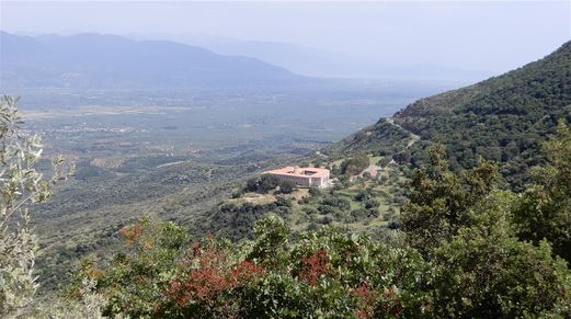 The new Voulkano Monastery seen from the road coming from Mavromati.