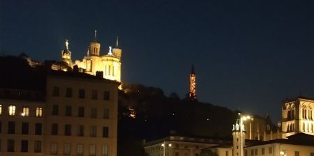Pont Bonaparte by night. Cathédrale Saint-Jean-Baptiste is in the middle and Basilique Notre Dame de Fourvière on the hill on the left.