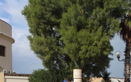 The cast-iron cannon and the monument of the Jewish settlement of Jaffa outside St. Peter's Church.