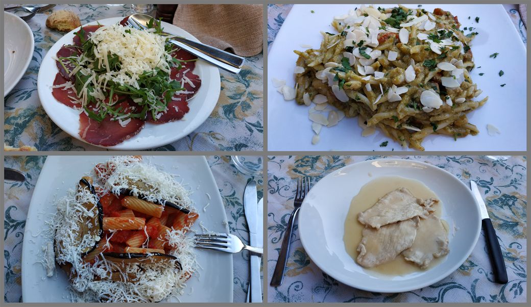 Lunch at Trattoria da Antonio, Castello Ursino. (clockwise from top left): Bresaola carpaccio with rucola and cheese; handmade pasta with almonds and pistachio; pork in marsala wine sauce and pasta Norma.