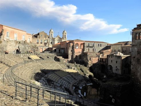 Teatro Romano. The church seen at the back, outside the theater, is Chiesa di San Francesco d’Assisi all’Immacolata.
