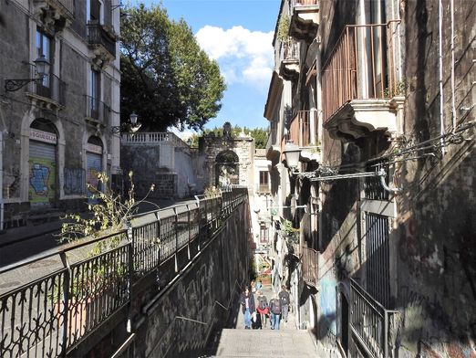The entrance to the Villa Cerami at the background, and the stairs at the end of Via dei Crociferi leading down to Via Etnea (via Via Penninello).