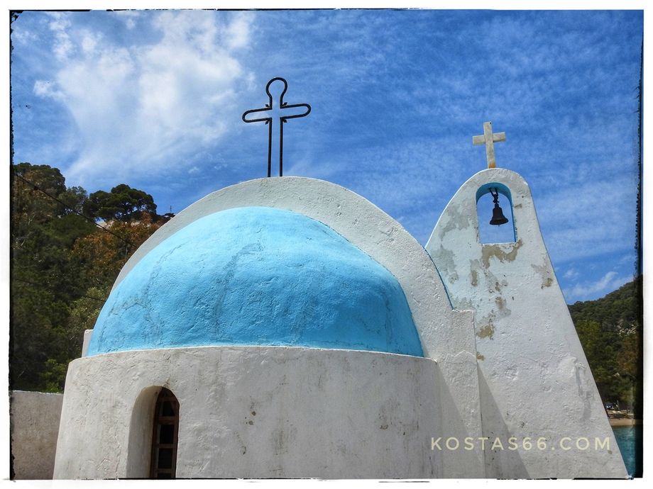 The Agios Nikolaos chapel on the shores of Vouliagmeni Lake.