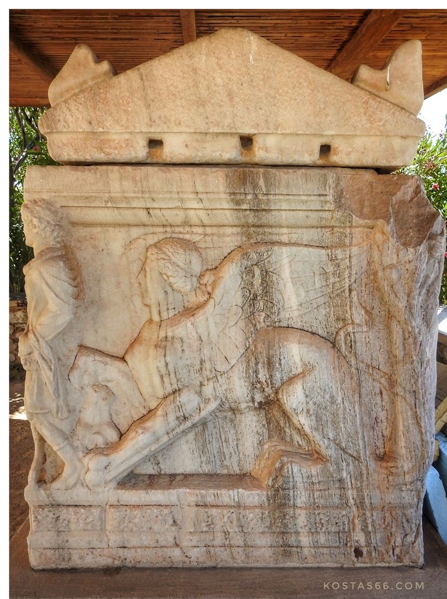 Marble sarcophagus with a relief of a Sphinx on its side face (2nd century AD), in the courtyard of the Archaeological Museum of Eleusis.