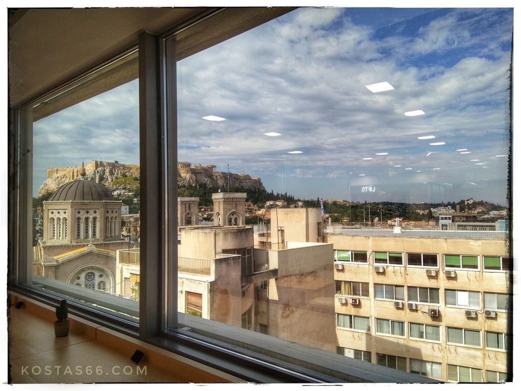 The SE side of the Acropolis seen from the cafe of the Marks & Spencer store on Ermou street.