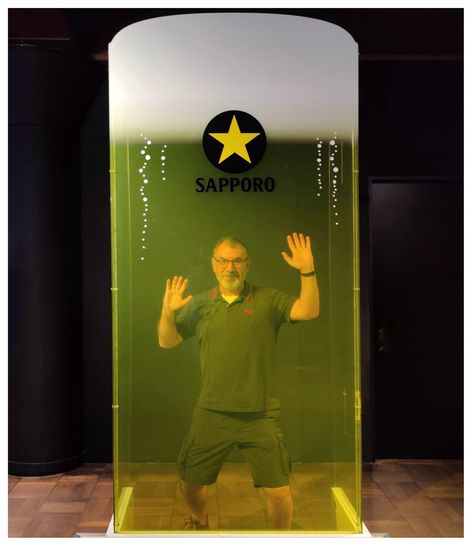 Trapped in a glass of Sapporo beer.