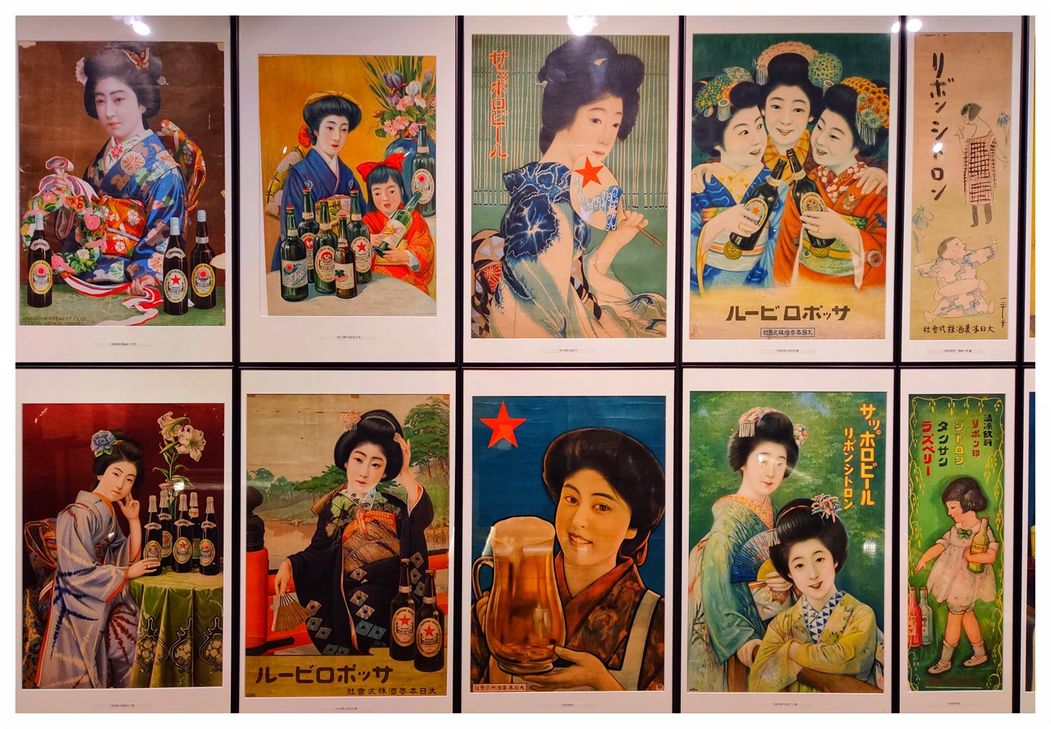 Old Sapporo beer posters at Sapporo beer museum.