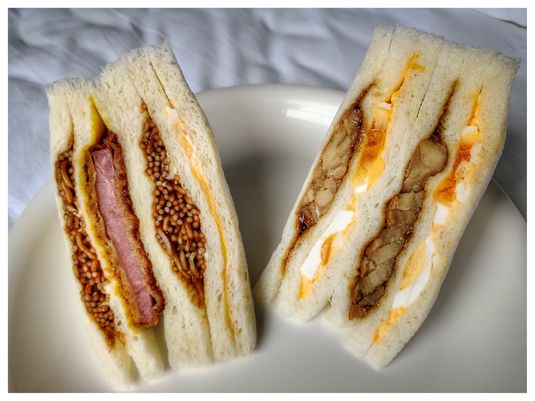 Soba noodles and Hamu katsu sandwich (left) Teriyaki chicken and egg sandwich (right).