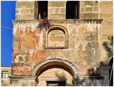 The external frescos of the Taxiarches (Archangels) at the bell-tower of the “The Presentation of the Virgin Mary” church.