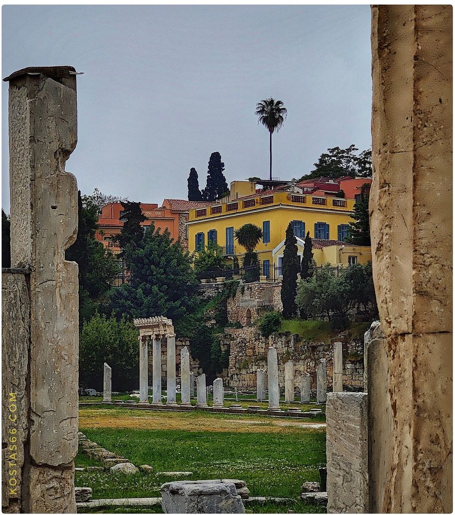 The Roman Agora seen through the columns of the Gate of Athena Archegetis.
