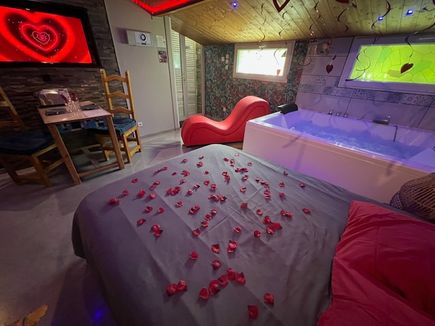 chambre avec fauteuil tantra romantique