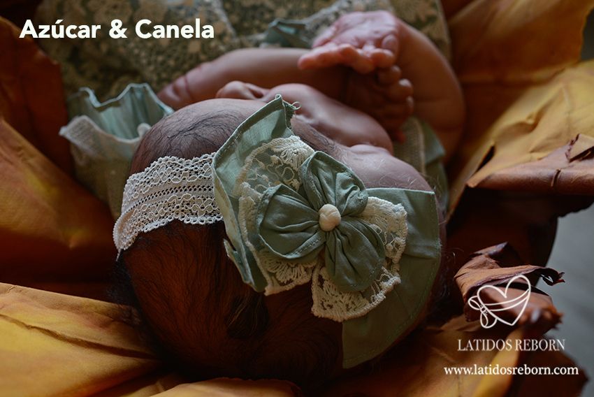 02 AZÚCAR & CANELA logo