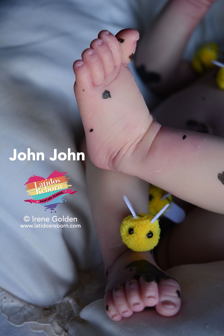 06 JOHN JOHN LOGO