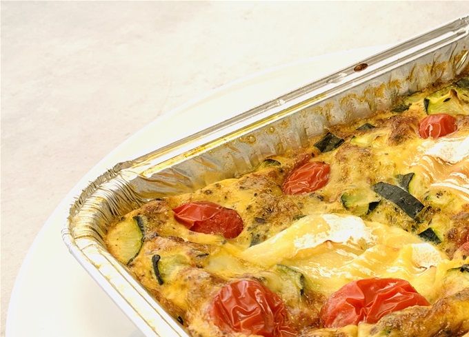 Gratin de tomates cerises, courgettes et fromage de chèvre