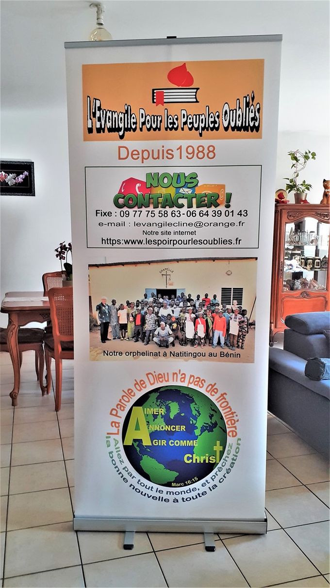 Voici notre nouvelle conception montée sur roll-up qui sera présentée dans tous nos déplacements. Depuis 34 ans L’Évangile Pour Les Peuples Oubliés (L’EPPO) reste une association créée en 1988 par Mr et Mme CLINE, ils nous ont remis le flambeau en 2015 pour poursuivre le travail dans l’œuvre de la mission.  La Bible et ses quatre Evangiles, c’est l’espoir pour tous, et ceux qui sont oubliés. Elle annonce Jésus-Christ ressuscité qui peut transformer des vies.   Martine et moi, nous sommes soutenus par une solide équipe d’amis (es) depuis la genèse de la création de L’EPPO. Notre association remporte un réel succès, non par notre savoir-faire, mais par la grâce de Dieu qui nous guide dans toutes les bonnes décisions, et par les dons. Le travail dans cette mission reste pour nous un privilège de grande importance. Notre souhait pour faire valoir ce que Dieu fait, c’est espérer une invitation pour nous faire connaitre, pour témoigner des miracles don nous sommes les témoins. J’ai l’honneur parler face à face avec vous pour témoigner comment nous avons été appelés dans la mission, par des vidéos, des photos réalisés sur place au Bénin. Nous vous disons à bientôt !  René ARME : Président L’EPPO  Voir moins ---------------------------------------------------------------------------------------------------------------------- Here is our new design mounted on a roll-up which will be presented in all our trips. For 34 years, L'Évangile Pour Les Peuples Oubliés (L'EPPO) has been an association created in 1988 by Mr and Mrs CLINE, they handed over the torch to us in 2015 to continue the work of the mission.  The Bible and its four Gospels are the hope for all, and for those who are forgotten. It proclaims the risen Jesus Christ who can transform lives.   Martine and I have been supported by a solid team of friends since the genesis of EPPO. Our association is successful, not because of our know-how, but because of the grace of God who guides us in all the right decisions, and because of donations. The work in this mission remains for us a privilege of great importance. Our wish to showcase what God is doing is to hope for an invitation to make ourselves known, to witness the miracles we are witnessing. I have the honour to speak face to face with you to testify how we have been called to the mission, through videos and photos taken in Benin. See you soon!  René ARME: President of EPPO   Translated with www.DeepL.com/Translator (free version)